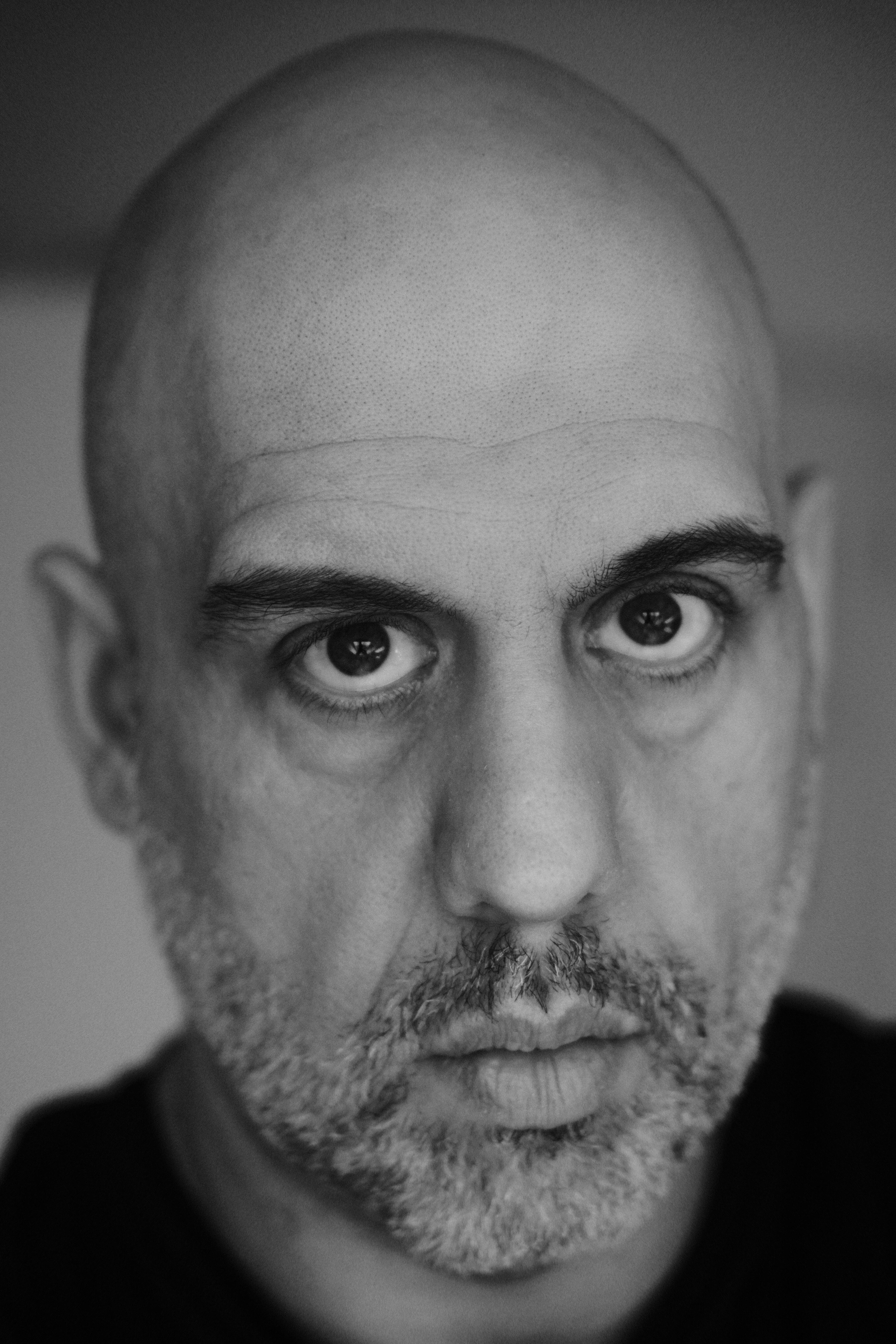 A professional headshot of the author.